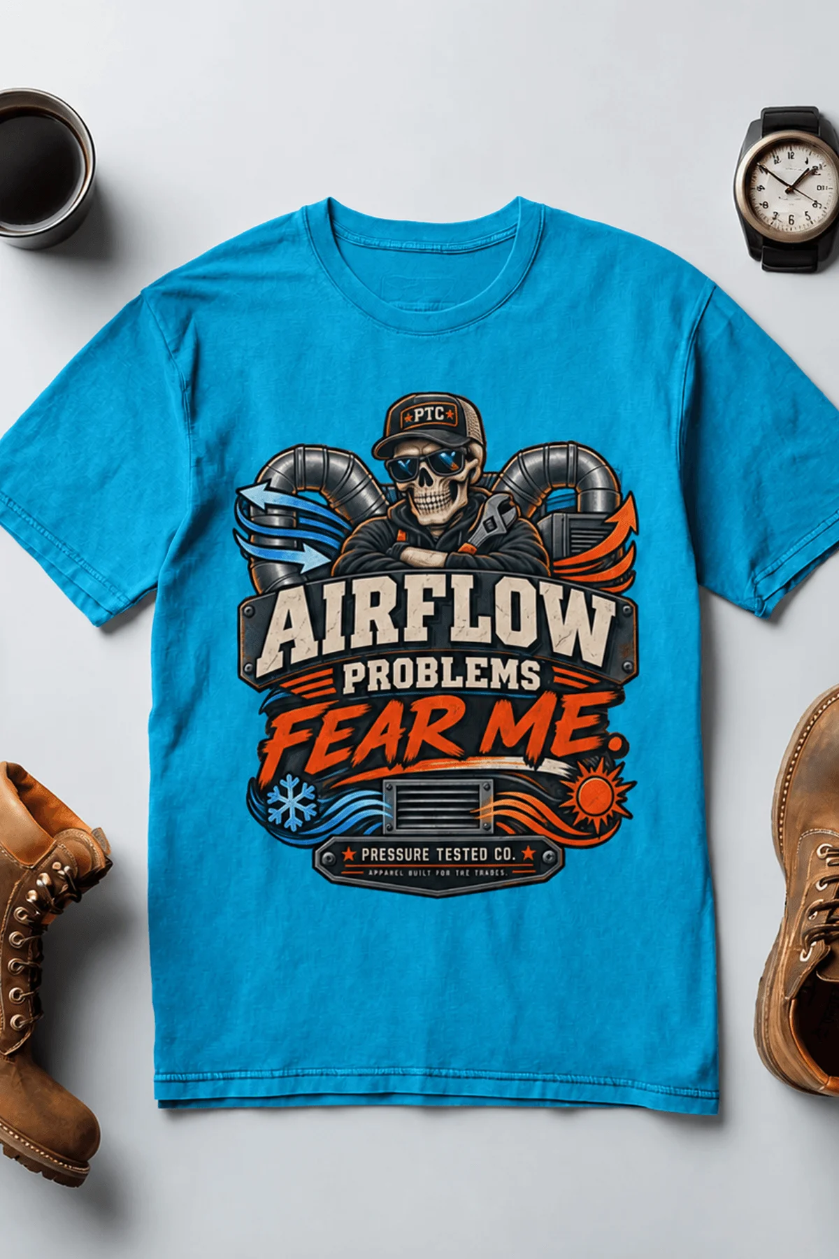 Airflow Problems Fear Me T-Shirt — HVAC Technician Skull Logo Tee — sapphire t-shirt, flat-lay product photo | Pressure Tested Co