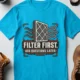 T-Shirt — "Filter First. Ask Questions Later." HVAC Air Filter Graphic — sapphire t-shirt, flat-lay product photo | Pressure Tested Co