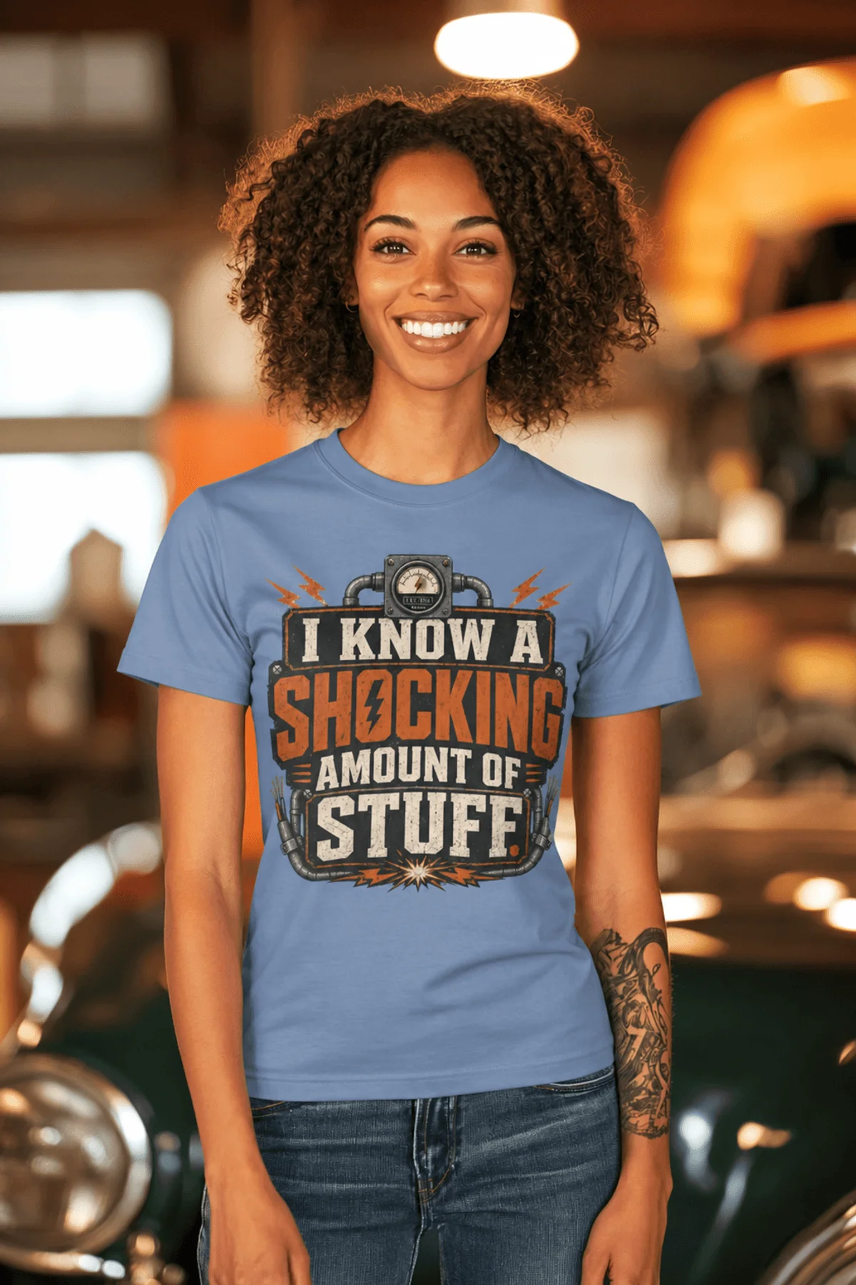 I Know A Shocking Amount Of Stuff T-Shirt — Electrician Science Humorous Tee — steel-blue t-shirt, model photo | Pressure Tested Co