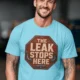 "The Leak Stops Here" Stop Sign Badge Style — Plumbing Repair Tech Humorous Tee — turquoise t-shirt, model photo | Pressure Tested Co