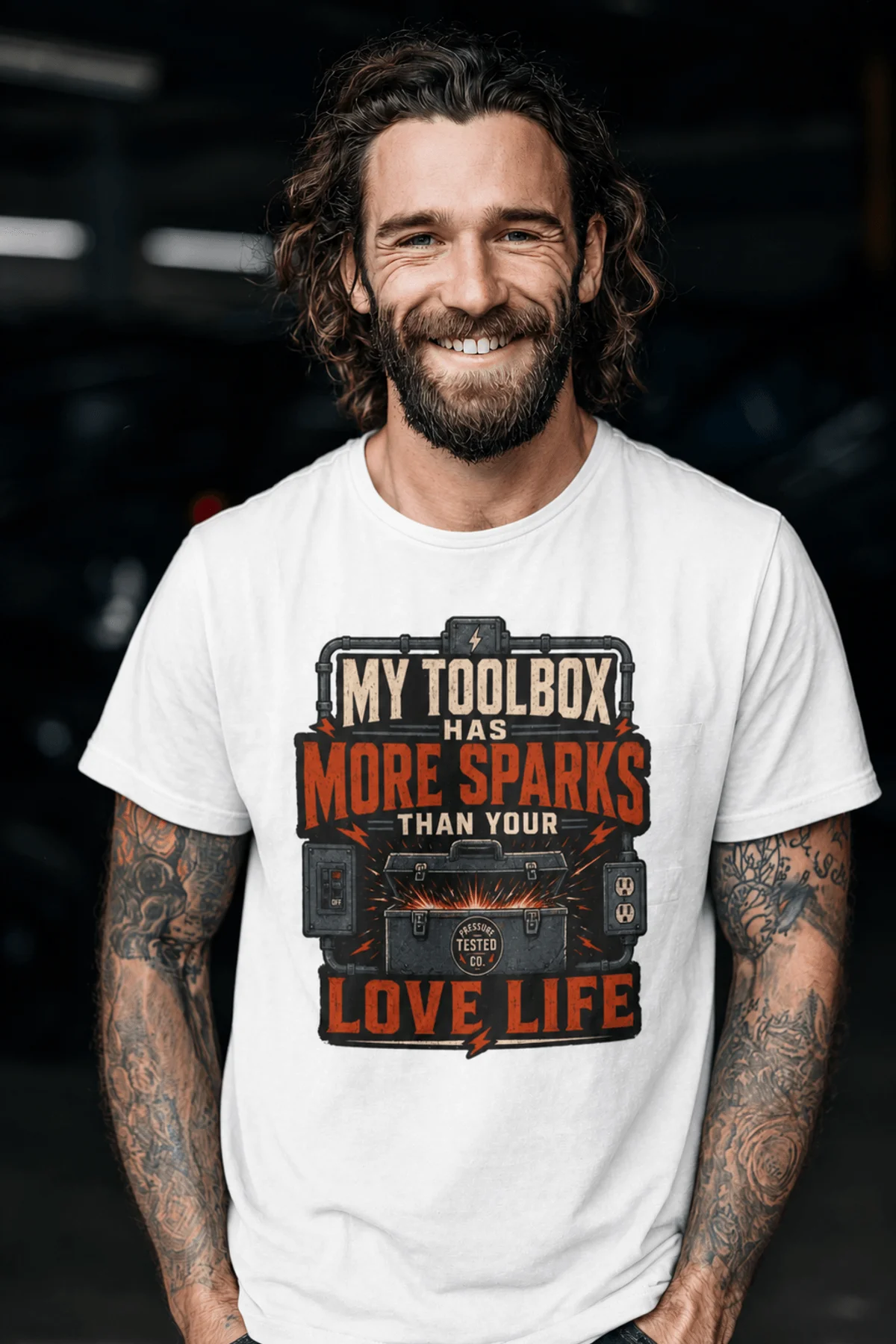 T-Shirt — "My Toolbox Has More Sparks Than Your Love Life" Electrician/Mechanic Workshop Tee — white t-shirt, model photo | Pressure Tested Co