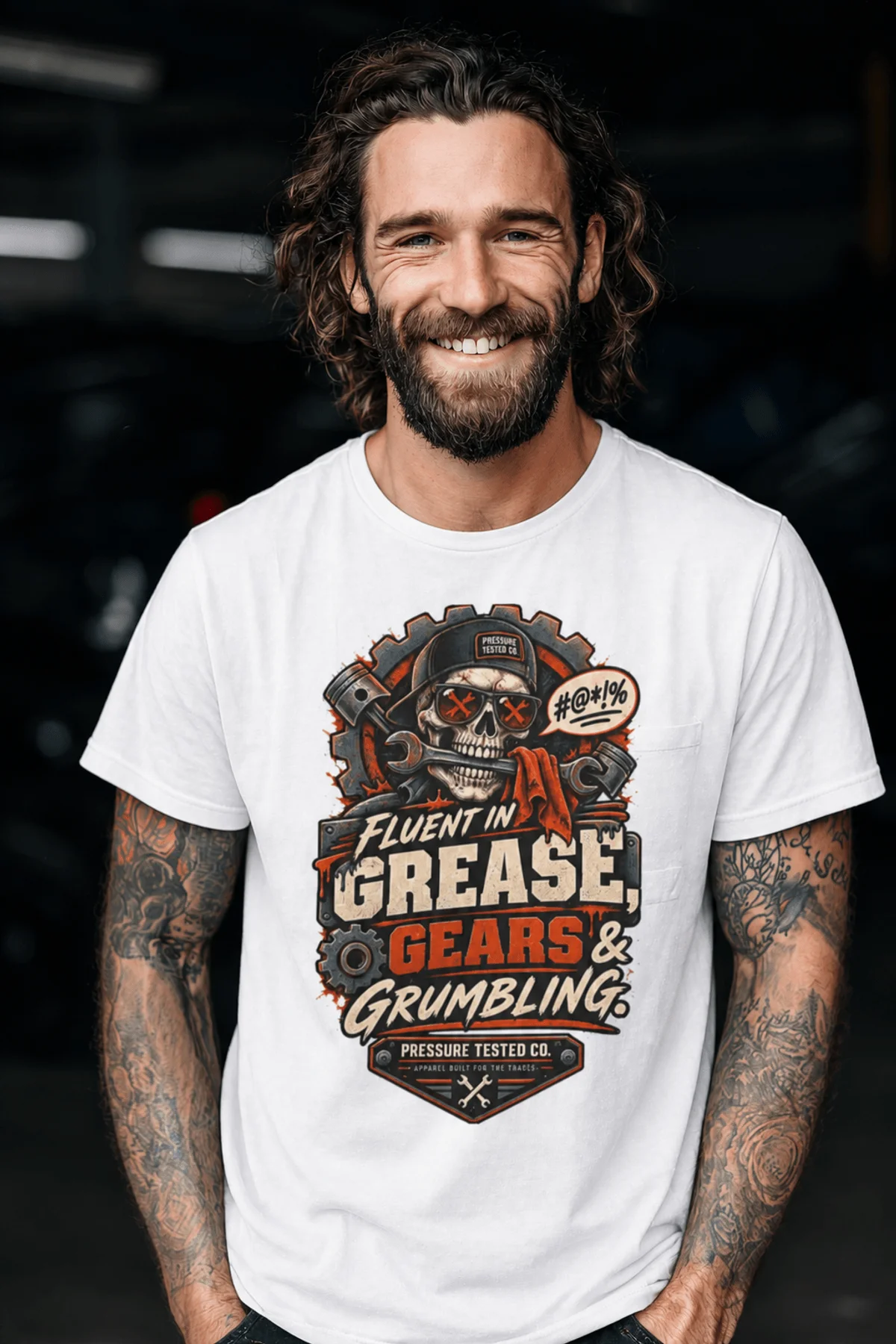 Mechanic Skull T-Shirt — "Fluent in Grease, Gears and Grumbling" Graphic Tee — white t-shirt, model photo | Pressure Tested Co