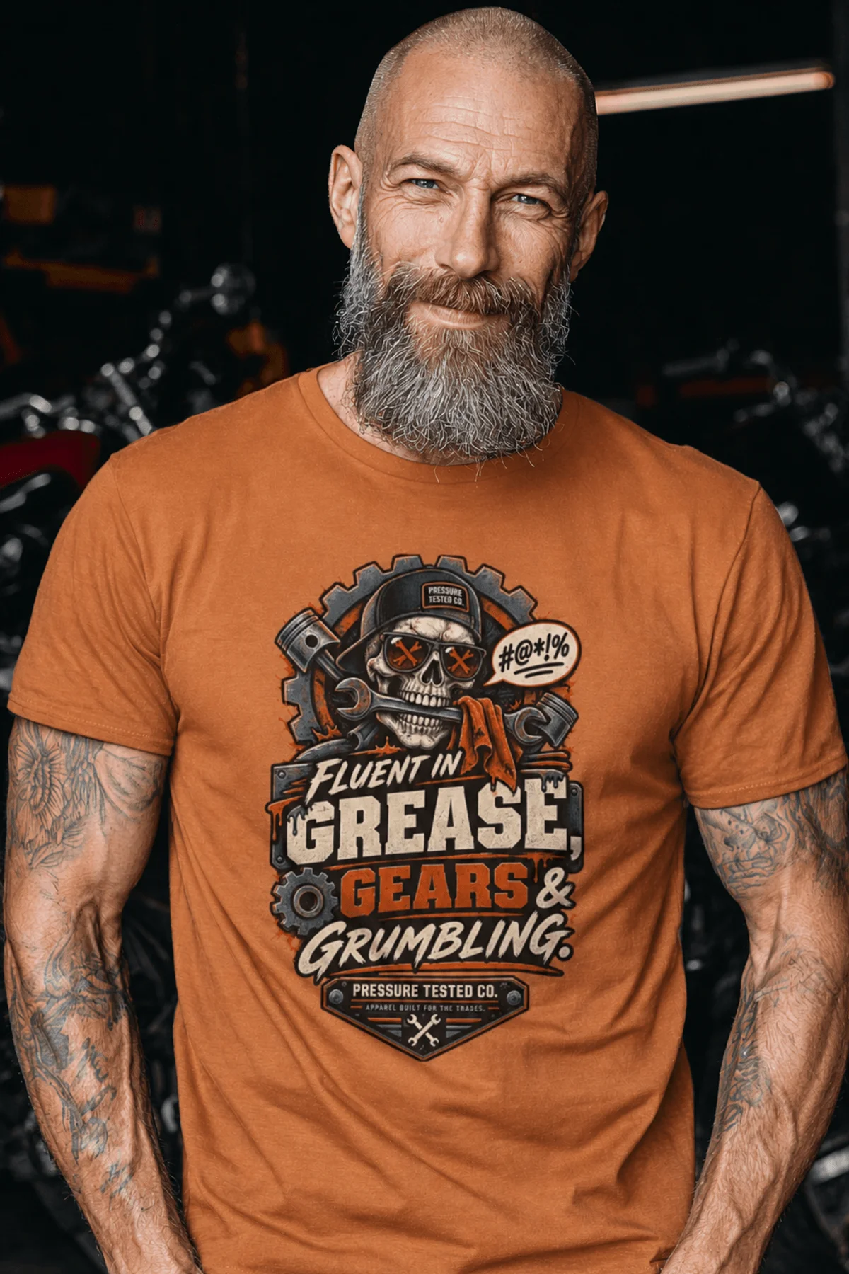 Mechanic Skull T-Shirt — "Fluent in Grease, Gears and Grumbling" Graphic Tee — yam t-shirt, model photo | Pressure Tested Co