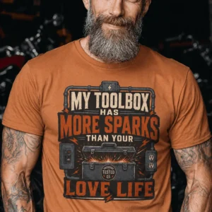 T-Shirt — "My Toolbox Has More Sparks Than Your Love Life" Electrician/Mechanic Workshop Tee — yam t-shirt, model photo | Pressure Tested Co