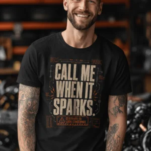 Call Me When It Sparks Graphic Tee — Vintage Industrial Spark Design — black t-shirt, model photo | Pressure Tested Co