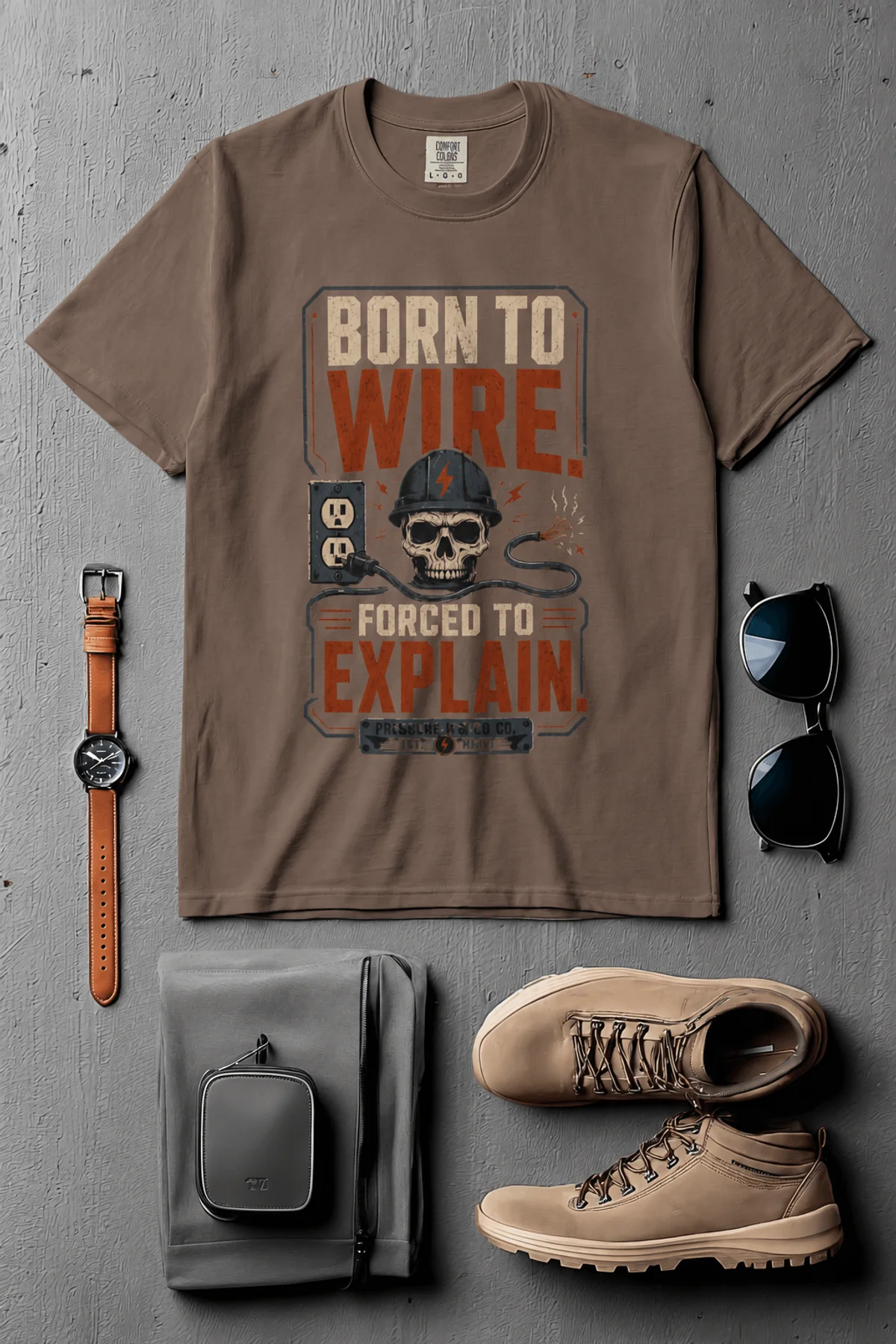 Electrician T-Shirt — "Born to Wire, Forced to Explain" Vintage Skull Tee — espresso t-shirt, flat-lay product photo | Pressure Tested Co