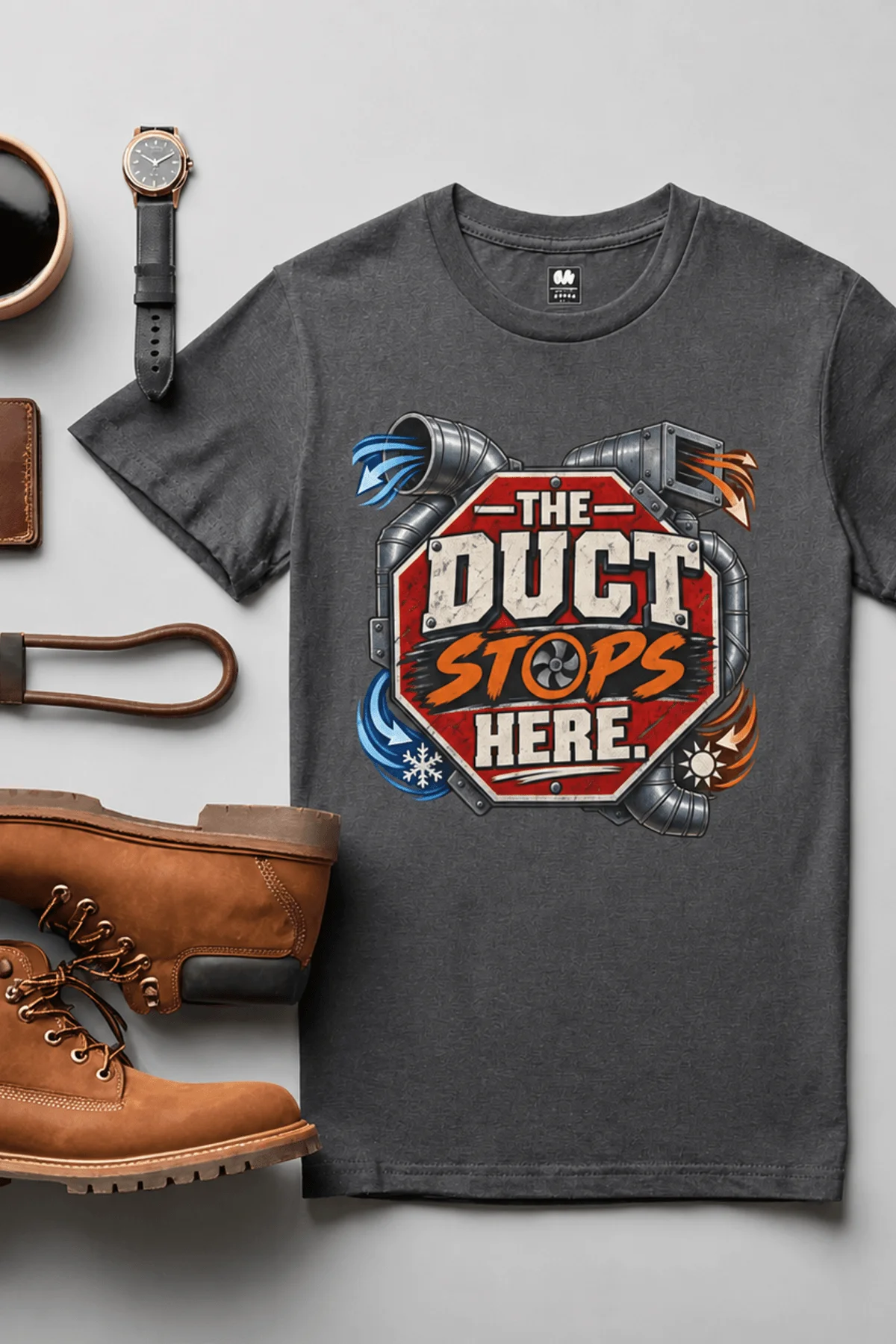 The Duct Stops Here T-Shirt — HVAC Technician Funny Logo Tee — graphite t-shirt, flat-lay product photo | Pressure Tested Co